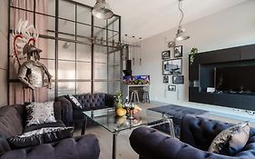 Lumina Loft Tymienieckiego with a view of the lake